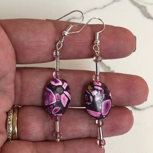 Oval pink and black earrings